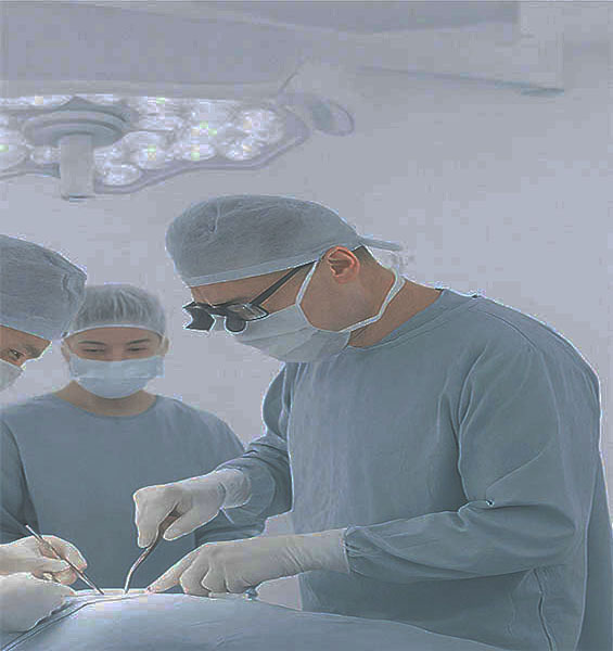 Surgeons performing an orthopedic procedure with advanced equipment